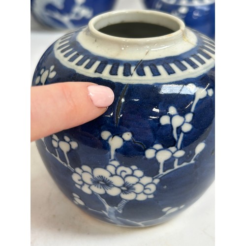128 - 7 Chinese blue and white porcelain prunus pattern ginger jars and covers, largest 15cm