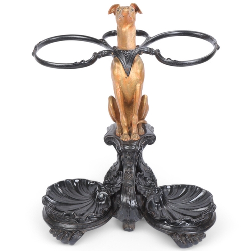 COALBROOKDALE & CO - a rare Victorian painted cast-iron 'Whippet' dog double stick stand, modelled as a seated Whippet on black foliate stand, with 2 removeable shell drip trays, signed C-B-Dale Co, registration diamond mark 1856, height 76cm, width 60cm