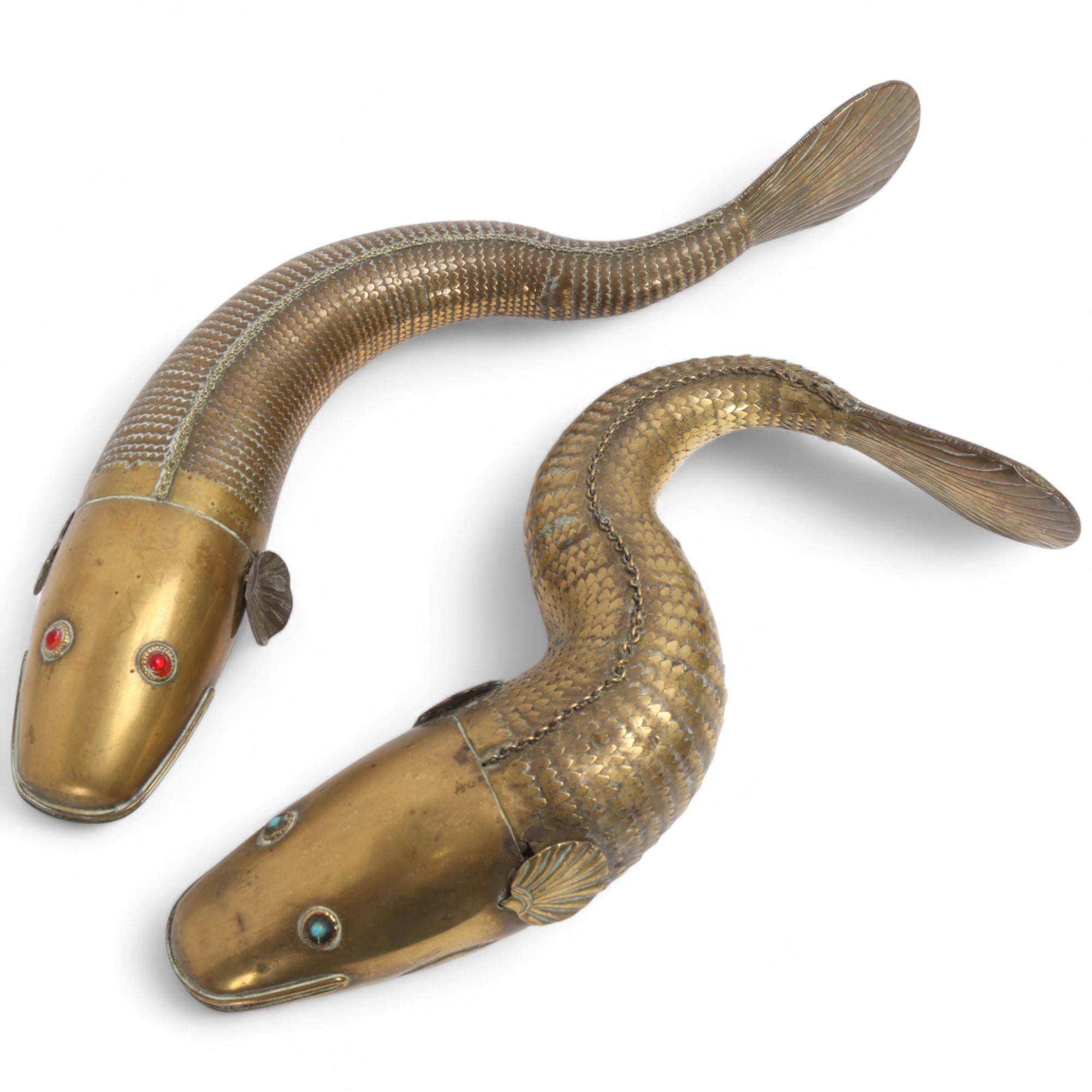 A pair of Indian brass Medina fish, articulated form, with gem set eyes ...