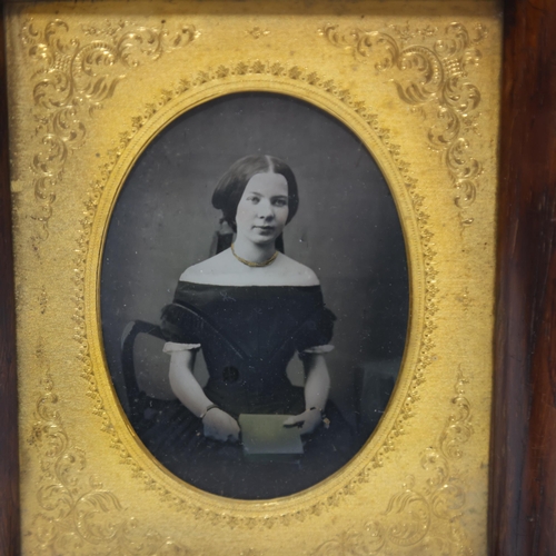 654 - A 19th century silver print photograph, portrait of a girl, rosewood frame, overall frame dimensions... 