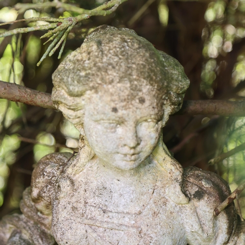 1001 - A pair of weathered concrete figures of children, on pedestal bases, overall height 113cm