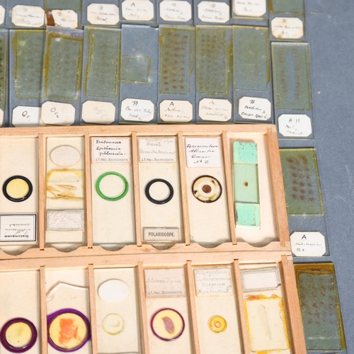 A collection of Antique microscope slides, examples including soldier ...