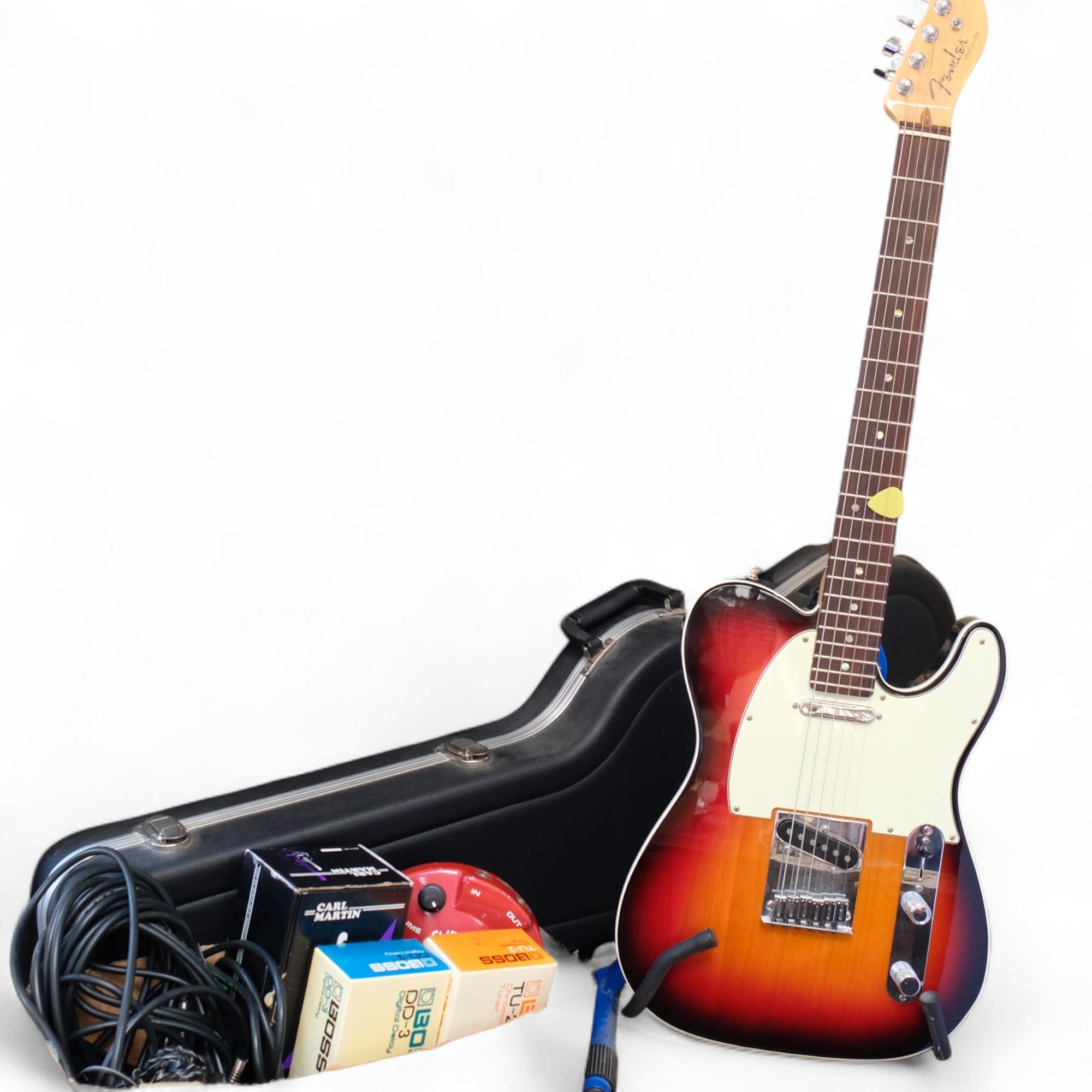 A Fender Telecaster electric guitar, serial no. DZ8017501, with various ...