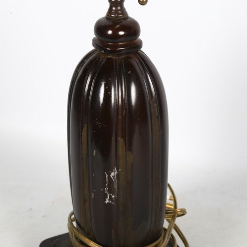 55 - JUST ANDERSEN - an Art Deco Danish Disko metal capsule form table lamp, model no. 1859, with double ... 