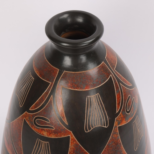 20 - Victor Barrios, Nicaragua, a hand made earthenware vase with sgraffito decoration, signed to base, h... 