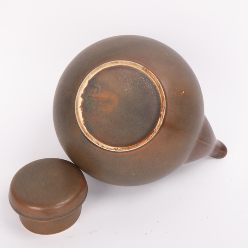 32 - An Arrabia GA3 model tea pot with cane handle, height 20cm