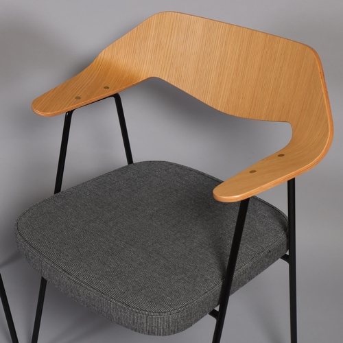 33 - A pair of Robin Day model 675 chairs, each with oak faced ply back and fabric upholstered seat by Ca... 