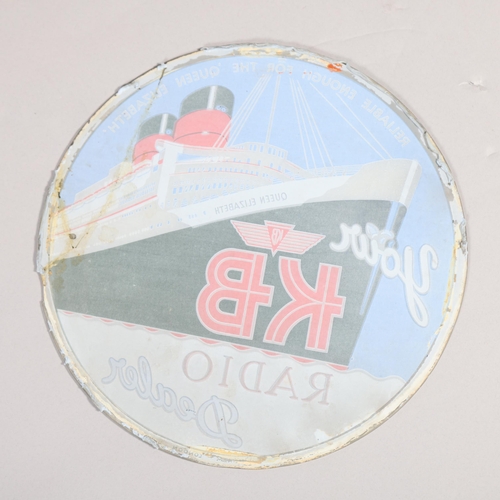 37 - A 1950s' glass advertising sign for KB Radio, with the Queen Elizabeth II ocean liner, diameter 29cm