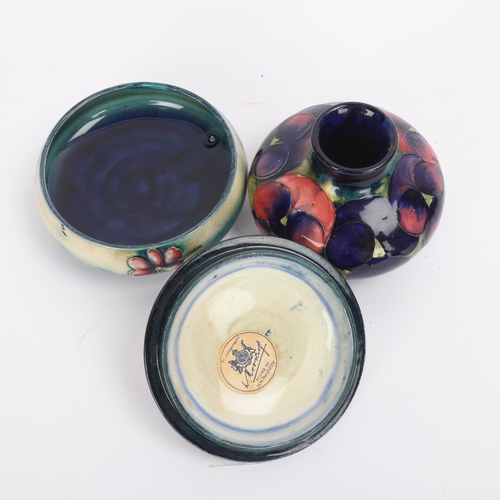 40 - A Moorcroft Pansy pattern vase, diameter 11cm and a Spring Flowers powder jar, diameter 12cm, both w... 
