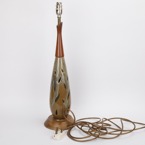 54 - A mid 20th century ceramic and teak lamp, ceramic with cut leaf and overglaze decoration, no makers ... 