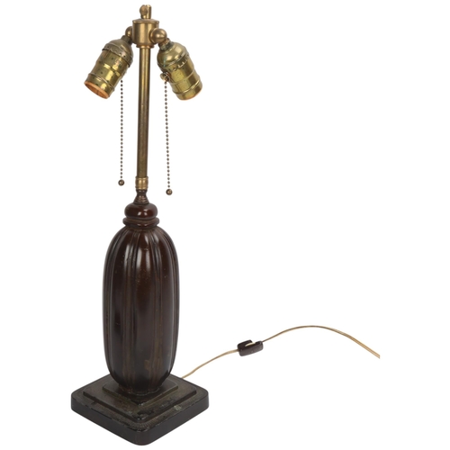 55 - JUST ANDERSEN - an Art Deco Danish Disko metal capsule form table lamp, model no. 1859, with double ... 