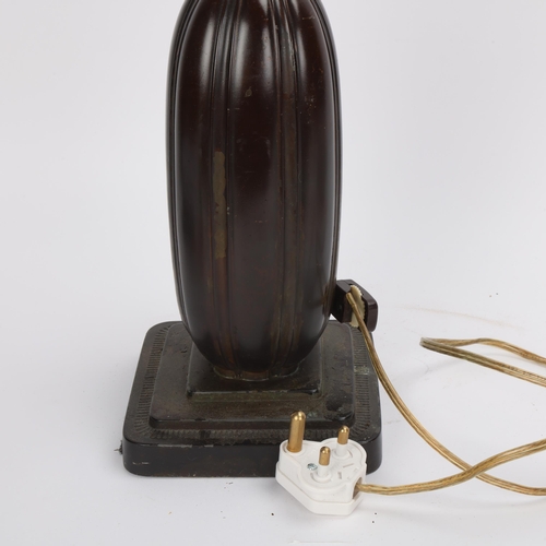 55 - JUST ANDERSEN - an Art Deco Danish Disko metal capsule form table lamp, model no. 1859, with double ... 