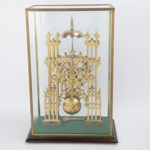 300 - A 19th century brass architectural style skeleton clock, circa 1880, pierced steel chapter ring with... 
