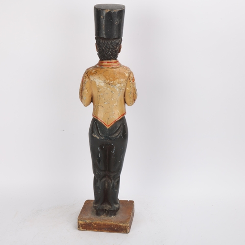 321 - A carved and painted wood bellboy business card holder, early 20th century, height 55cm