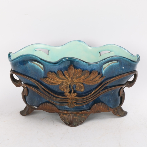 323 - An Art Nouveau gilt-bronze table centre bowl/planter, with turquoise glaze ceramic liner, length 27c... 