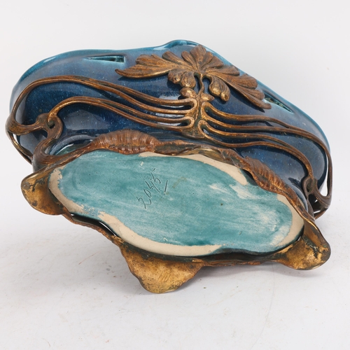 323 - An Art Nouveau gilt-bronze table centre bowl/planter, with turquoise glaze ceramic liner, length 27c... 