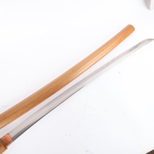 324 - A Japanese Second World War Period Katana sword, Tang signed Kane Mitsu dated 1943, blade has been r... 