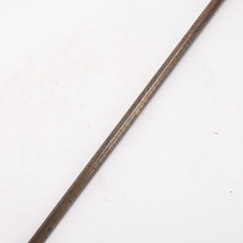 325 - A Chinese bronze walking cane with figural handle, the bronze shaft decorated with figures and text,... 
