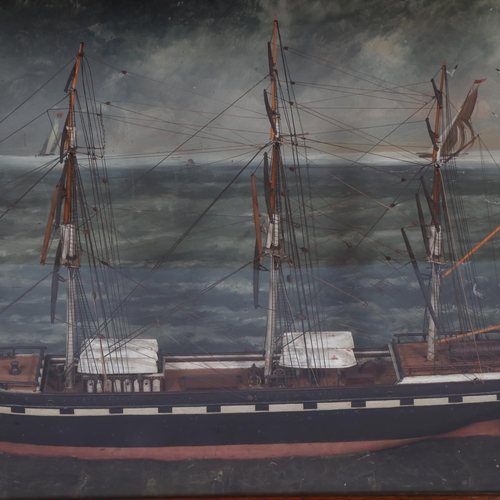 326 - An early 19th century model of a 3-masted sailing ship, possibly a whaler, housed in very unusual ma... 