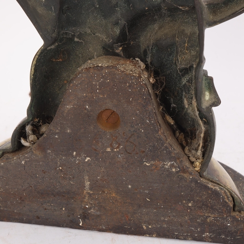 328 - An English 19th century heavy cast-brass and cast-iron doorstop, depicting Cupid and the Serpent, he... 