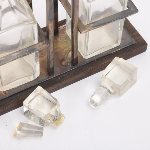 331 - An Art Deco 2-bottle cruet stand, coromandel electroplate and cut-glass, height 19cm