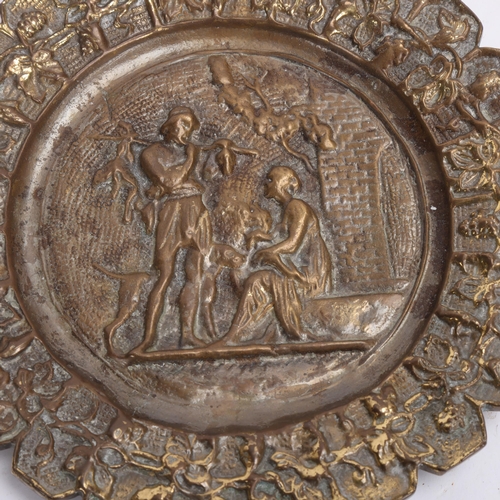 332 - A pair of relief cast bronze plaques, with Classical figure panels, diameter 19cm