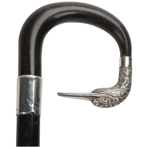 344 - An ebony and horn-mounted walking cane, with silver duck head terminal and glass eyes, hallmarks Lon... 