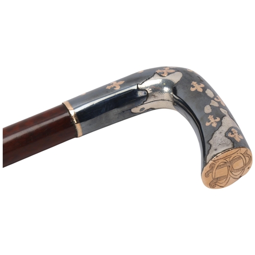 345 - A 19th century silver niello and gold inlaid cane, with snakewood shaft and fleur-de-lis decorated h... 