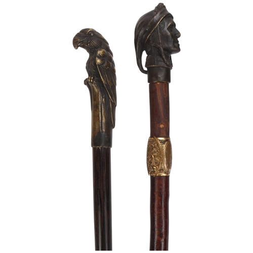 354 - 2 bronze-handle walking canes, 1 with Dante head handle, the other with a parrot handle (2)