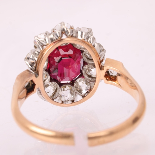 1120 - A fine 18ct gold ruby and diamond cluster ring, claw set with 2.5ct oval mixed-cut ruby surrounded b... 