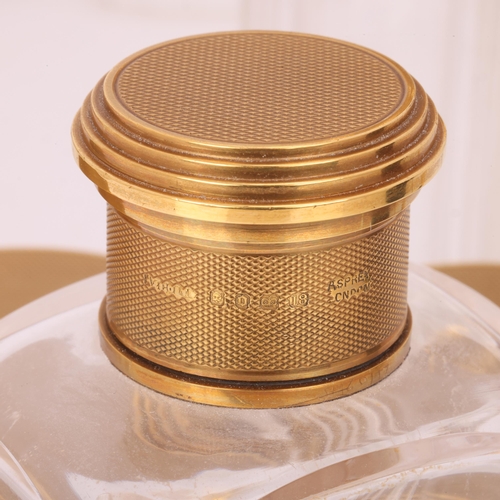 1124 - ASPREY - an Art Deco 18ct gold mounted glass 8-piece dressing table toilet jar set, London 1929, com... 
