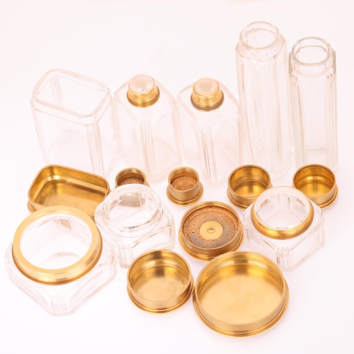 1124 - ASPREY - an Art Deco 18ct gold mounted glass 8-piece dressing table toilet jar set, London 1929, com... 
