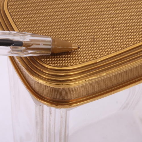 1124 - ASPREY - an Art Deco 18ct gold mounted glass 8-piece dressing table toilet jar set, London 1929, com... 