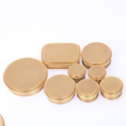 1124 - ASPREY - an Art Deco 18ct gold mounted glass 8-piece dressing table toilet jar set, London 1929, com... 