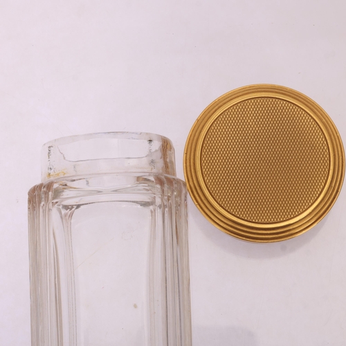 1124 - ASPREY - an Art Deco 18ct gold mounted glass 8-piece dressing table toilet jar set, London 1929, com... 