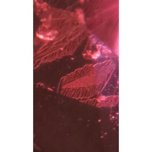 1120 - A fine 18ct gold ruby and diamond cluster ring, claw set with 2.5ct oval mixed-cut ruby surrounded b... 