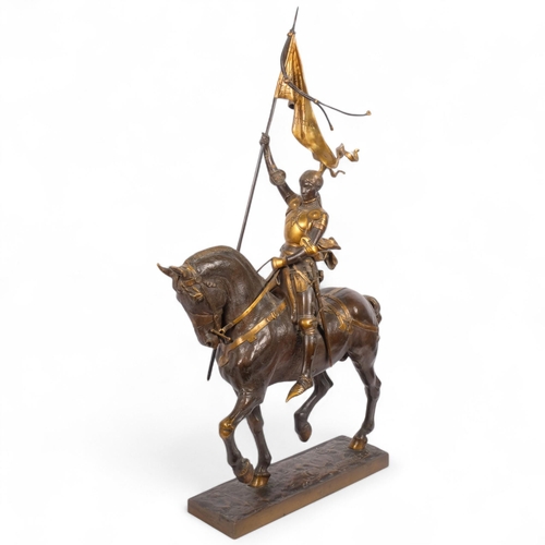Emanuel Fremiet (1824 - 1910), an impressive patinated bronze figure of Joan Of Arc on horseback, in full regalia carrying the standard, on a naturalistic stand, base impressed E Fremiet, H73cm