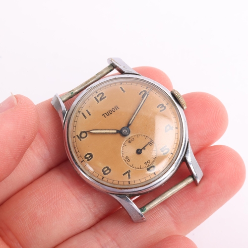 1010 - TUDOR - a Vintage nickel mechanical wristwatch head, ref. 768, circa 1968, silvered dial with Arabic... 