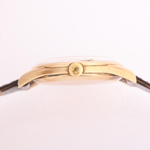 1011 - OMEGA - a Vintage 9ct gold mechanical wristwatch, ref. 121.5400, circa 1964, silvered dial with gilt... 