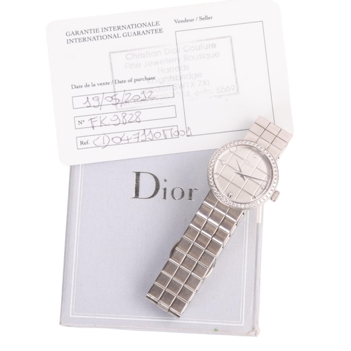 1035 - CHRISTIAN DIOR - a lady's stainless steel diamond La Dior quartz bracelet watch, ref. CD047110, circ... 