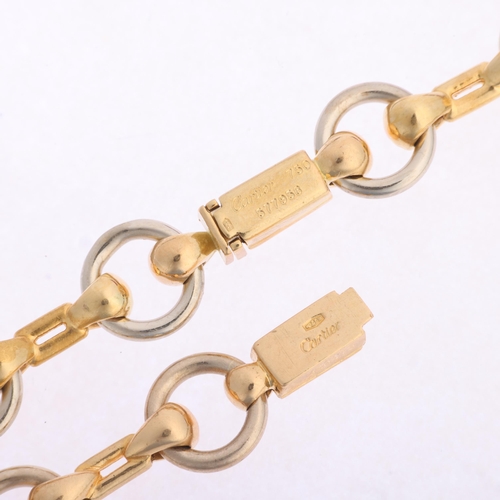1110 - CARTIER - a Vintage 18ct two-colour gold snaffle horsebit link chain necklace and bracelet set, both... 