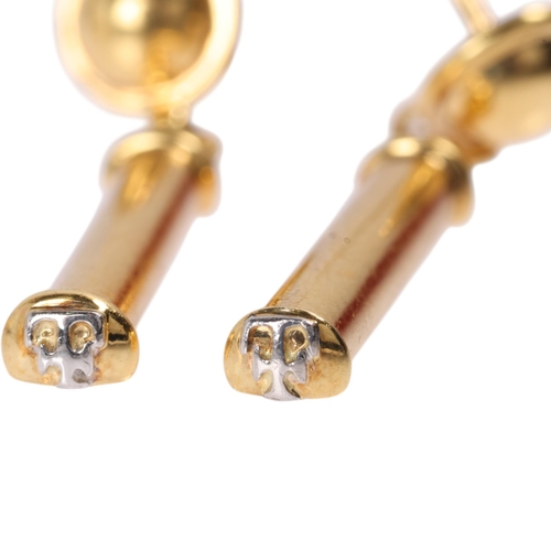 1111 - THEO FENNELL - a pair of 18ct gold 'Shaft' drop stud earrings, the plain polished drop signed with T... 