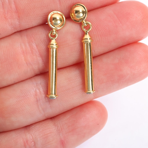 1111 - THEO FENNELL - a pair of 18ct gold 'Shaft' drop stud earrings, the plain polished drop signed with T... 