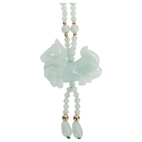 1323 - A Chinese 14ct jade horse pendant necklace, horse length 39.1mm, necklace 60cm, 63g