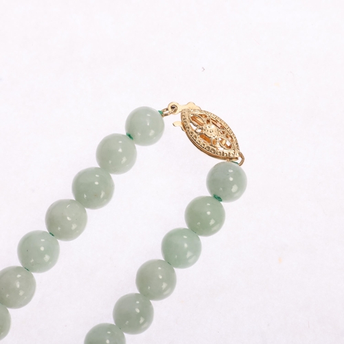 1323 - A Chinese 14ct jade horse pendant necklace, horse length 39.1mm, necklace 60cm, 63g