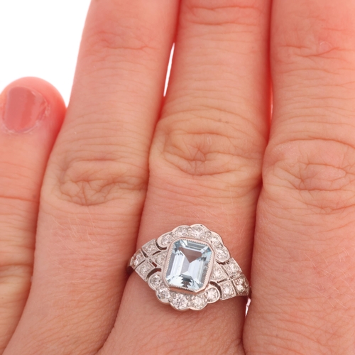 1332 - An Art Deco style platinum aquamarine and diamond panel ring, millegrain set with 1ct octagonal step... 
