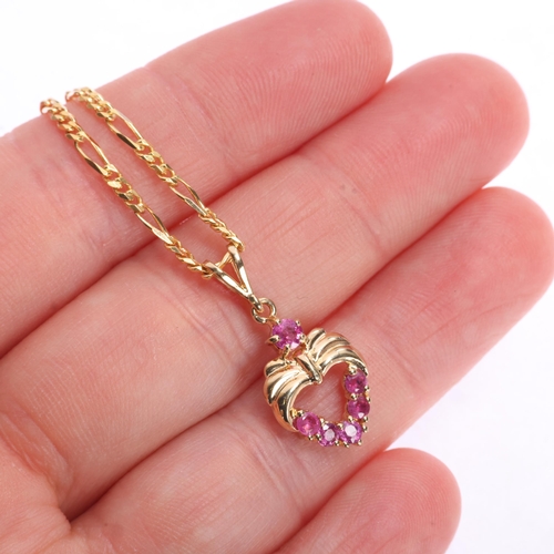 1333 - A 9ct gold ruby heart pendant necklace, on 9ct flat figaro link chain, pendant 24mm, chain 52cm, 5.8... 