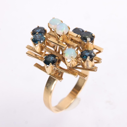 1335 - A Continental 14ct gold opal and sapphire abstract ring, set with round cabochon opal, round-cut tur... 