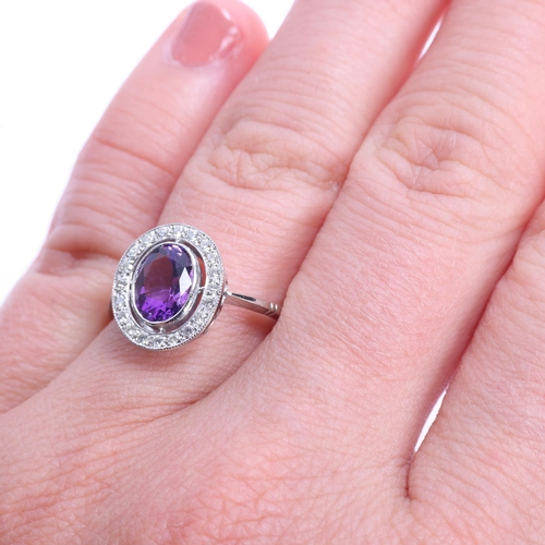 1336 - An Art Deco style platinum amethyst and diamond target cluster ring, millegrain set with oval mixed-... 