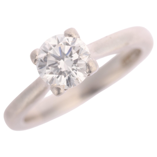 1344 - A GIA certified platinum 0.73ct single stone diamond ring, claw set with modern round brilliant-cut ... 